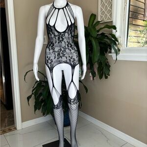 Black Chemise with Intricate Lace Design and Sheer Fabric